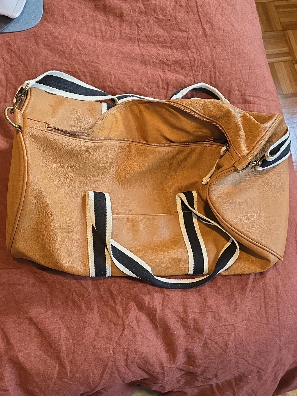 Tan Leather-Style Duffel Bag with Striped Handles